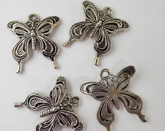 Butterfly charms.  Unique butterfly charms.  Silver plated butterfly charms.