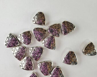 Triagular beads.  Floral design triangular beads.