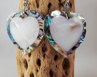 Heart shaped inlay earrings with abalone and mother of pearl. Dangly earrings of paua shells and mother of pearl.