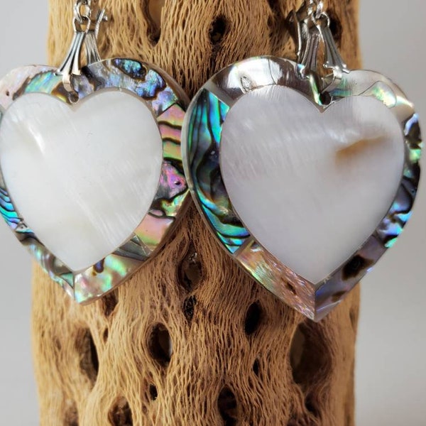 Heart shaped inlay earrings with abalone and mother of pearl. Dangly earrings of paua shells and mother of pearl.