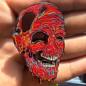 Trippy Red Melting Skull Head Enamel Pin