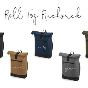 May include: Five roll top backpacks in different colors: black, navy, camel, gray, and olive. Each backpack has a white embroidered word on the front: "schwarz", "navy", "camel", "grau", and "olive".
