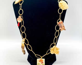 Bone-cut sea charms charms necklace with vermeil chain