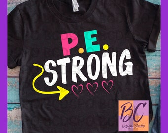 May include: Black t-shirt with the text "P.E. STRONG" in white with a yellow arrow pointing to the right and three pink hearts. The text "P.E." is in pink, turquoise, and yellow. The text "BC Design Studio" is in the bottom right corner.
