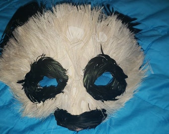 Peacock and rooster feather panda mask.