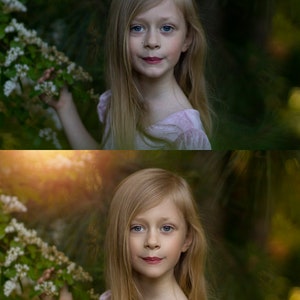 May include: A young girl with long blonde hair is standing in a garden. She is wearing a pink dress and looking directly at the camera. The background is blurred and features green foliage.