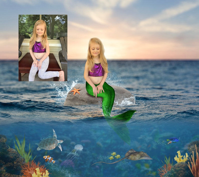 May include: A young girl dressed as a mermaid sits on a rock in the ocean. She is wearing a purple top and a green tail. The water is blue and there are some starfish and other sea creatures in the background.