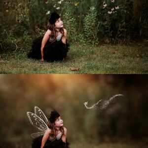 May include: A young girl wearing a black tulle dress and a black headband with a flower accent sits in a grassy field. She looks up at a sparkling fairy with translucent wings flying away from her.