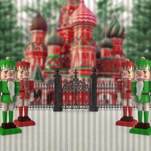May include: Four wooden nutcracker figurines stand in front of a blurred background of a red and white building. Two nutcrackers are green and two are red. The nutcrackers are wearing hats and have white beards.