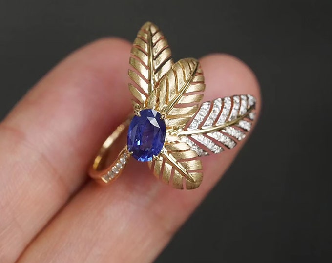 Exclusive Custom Order for Luke – Layaway Plan 1.2ct emerald as the center, 18k solid white gold base with 18k solid yellow gold leaves.