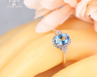 6x8mm 18k Rose Gold Twig Natural Swiss Blue Topaz Engagement