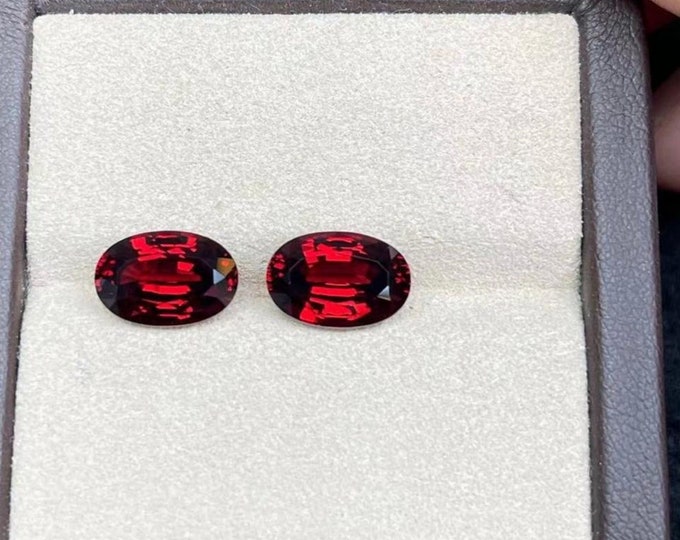 custom oval garnet ring, diamond halo, 6.2ct stone with certificate