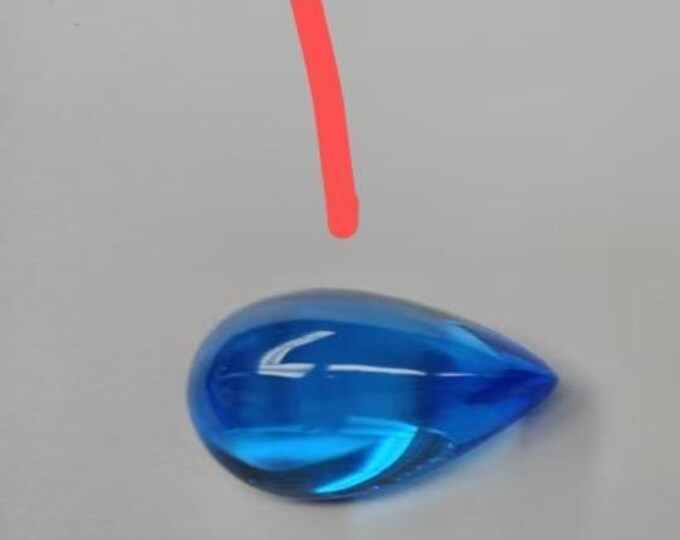 Layaway is available for your custom pendant with a 10mm round London blue cabochon, No1 pear topaz, and three long claws/300 deposit