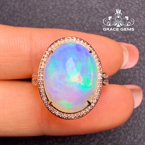 Huge Natural Ethiopian Opal Ring: 18k Rose Gold Diamond Halo Opal Engagement Ring/Unique statement opal jewelry/unique opal fine ring