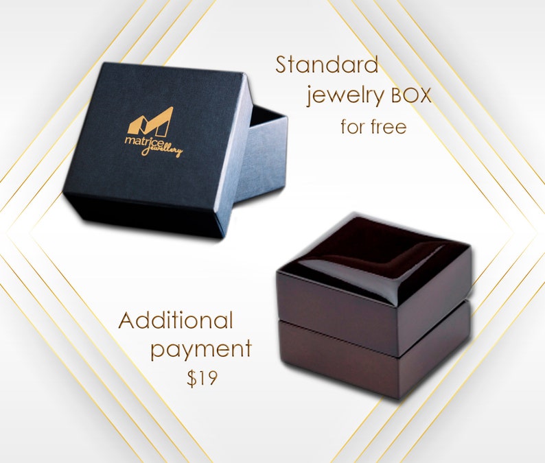 May include: Two jewelry boxes, one black with the text "matrice jewelry" and the other brown. The black box is labeled "Standard jewelry BOX for free" and the brown box is labeled "Additional payment $19".
