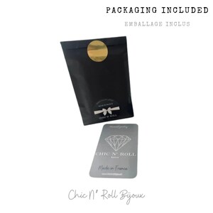 May include: Black packaging with a gold sticker and a white sticker that says "Chic N' Roll Bijoux" and "Made in France".