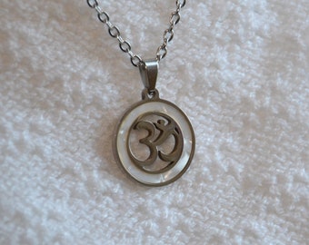 Ohm stainless steel and mother-of-pearl pendant mounted on a bail with its stainless steel link chain - spiritual jewel - yoga - meditation.