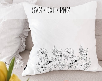 May include: A white pillow with black line art of flowers and leaves. The pillow is on a light gray couch. The text "SVG - DXF - PNG" is at the top of the pillow.