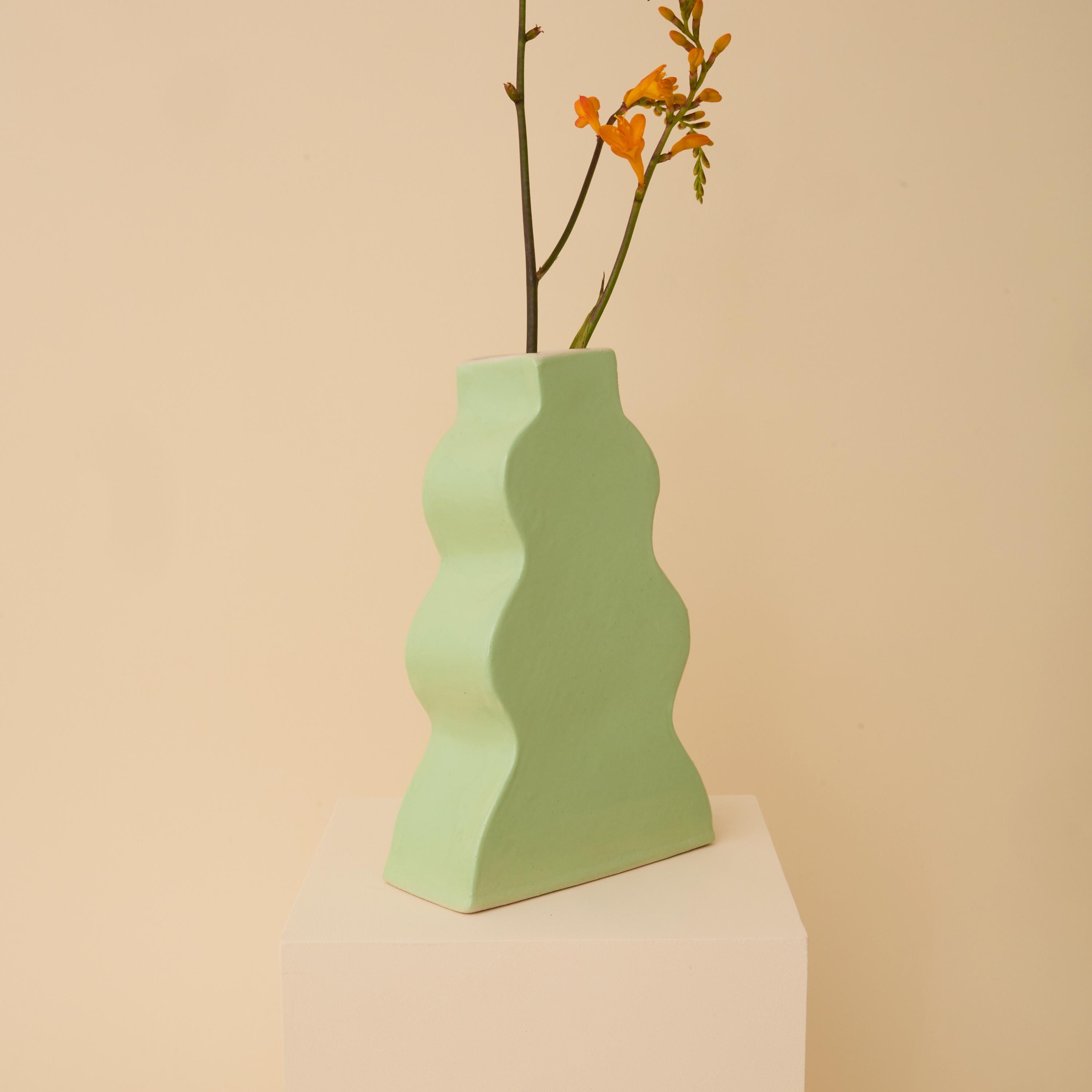 Handmade ceramic wavy vase in lime