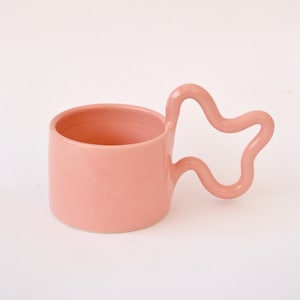 Pink handmade ceramic mug with wiggle handle image 1