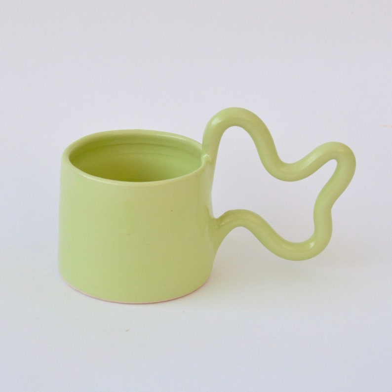 Green handmade ceramic mug with wiggle handle image 1