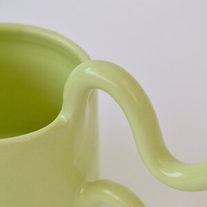 Green handmade ceramic mug with wiggle handle image 5