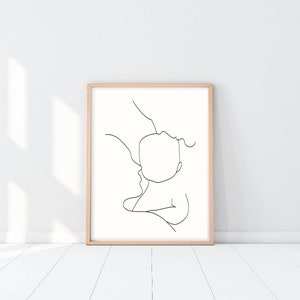 Puede incluir: Un dibujo en blanco y negro de una l&iacute;nea de un padre sosteniendo un beb&eacute;. El dibujo es de estilo simple, con la cabeza del padre y la cabeza del beb&eacute; conectadas por una sola l&iacute;nea.