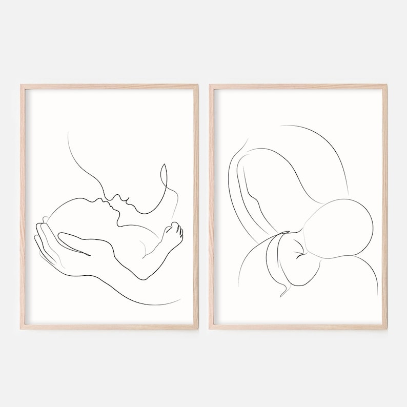 May include: Two black and white line drawings of a parent holding a baby. The first drawing shows the parent holding the baby in their arms, while the second drawing shows the parent holding the baby on their shoulder.