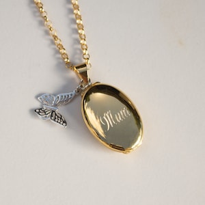 engraved gold oval Photo Necklace with silver butterfly charm