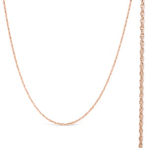 May include: A rose gold chain necklace with a delicate rope design. The chain is shown in two lengths, one shorter and one longer.