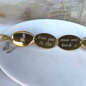 engraved gold oval Photo Necklace with silver butterfly charm