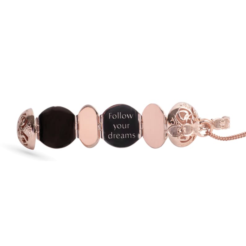 Rose Gold Locket Necklace in vintage style open on white background revealing reverse side engraved on the inner panels