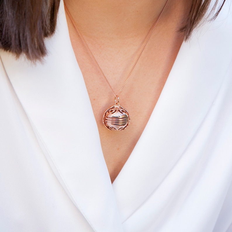 Woman Wearing a Rose Gold Locket Necklace in vintage style on rose gold chain