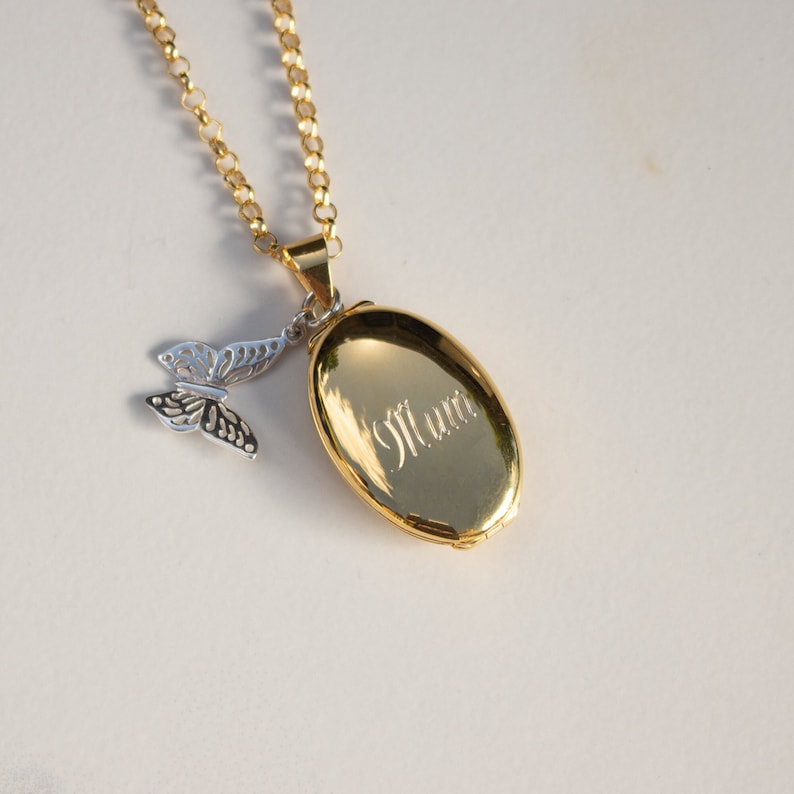 engraved gold oval Photo Necklace with silver butterfly charm