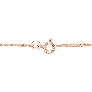Close-up of a rose gold curb chain clasp with a spring ring fastening and extension links.