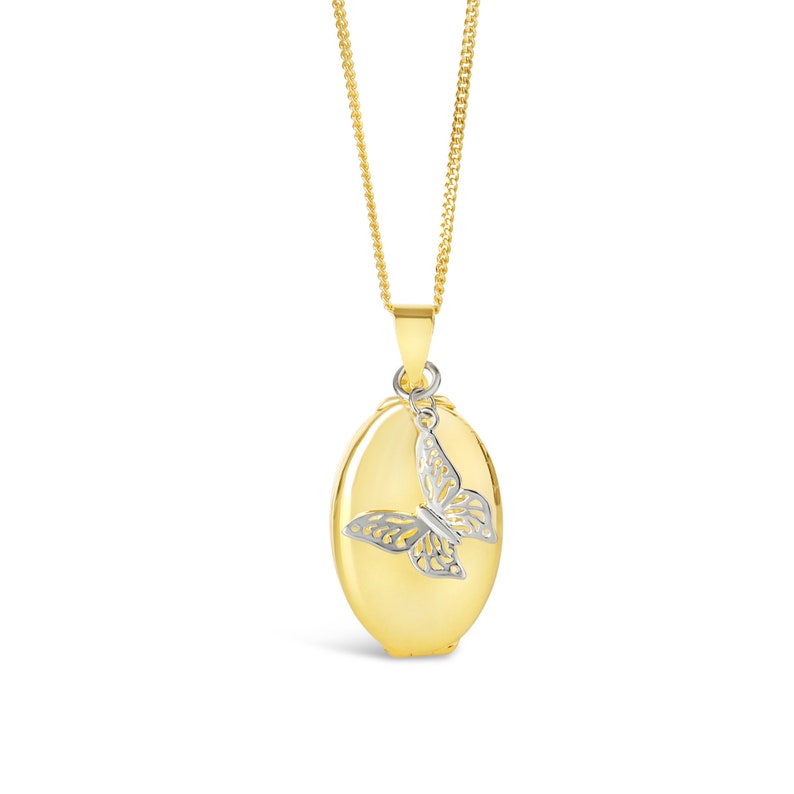 gold oval Photo Necklace with silver butterfly charm, white background