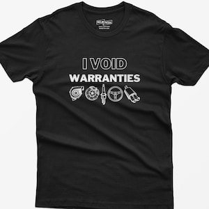 May include: Black t-shirt with white text that reads "I VOID WARRANTIES" and features a row of car parts including a turbocharger, spark plug, steering wheel, and exhaust pipe.