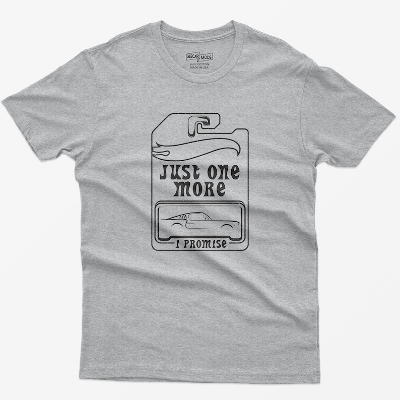 May include: Gray t-shirt with a black graphic of a car tag that says "Just one more I promise".
