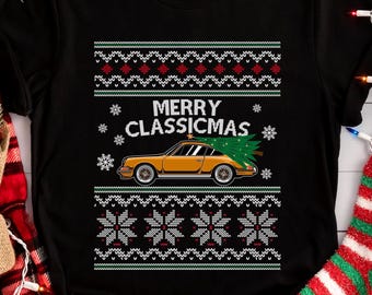 May include: A black short-sleeve t-shirt featuring a graphic print of a yellow sports car carrying a Christmas tree on its roof. The design includes the text MERRY CLASSICMAS and white and red Nordic-style snowflake and geometric patterns.