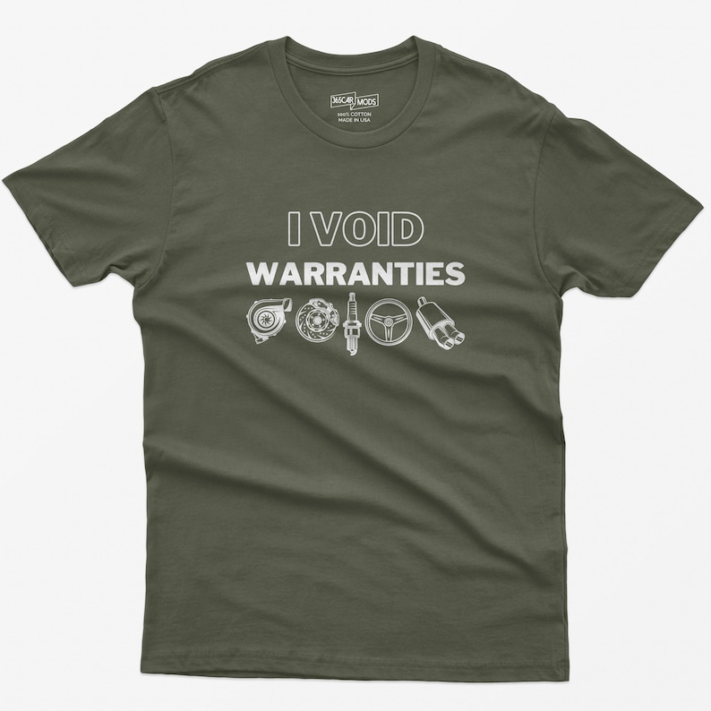 May include: A dark green t-shirt with the text "I VOID WARRANTIES" in white. The text is surrounded by small illustrations of car parts, including a turbocharger, spark plugs, a steering wheel, and an exhaust pipe.