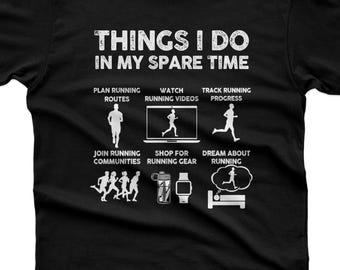 May include: A black short-sleeved t-shirt featuring white text that reads THINGS I DO IN MY SPARE TIME. Below the text are six icons with labels: PLAN RUNNING ROUTES, WATCH RUNNING VIDEOS, TRACK RUNNING PROGRESS, JOIN RUNNING COMMUNITIES, SHOP FOR RUNNING GEAR, and DREAM ABOUT RUNNING.