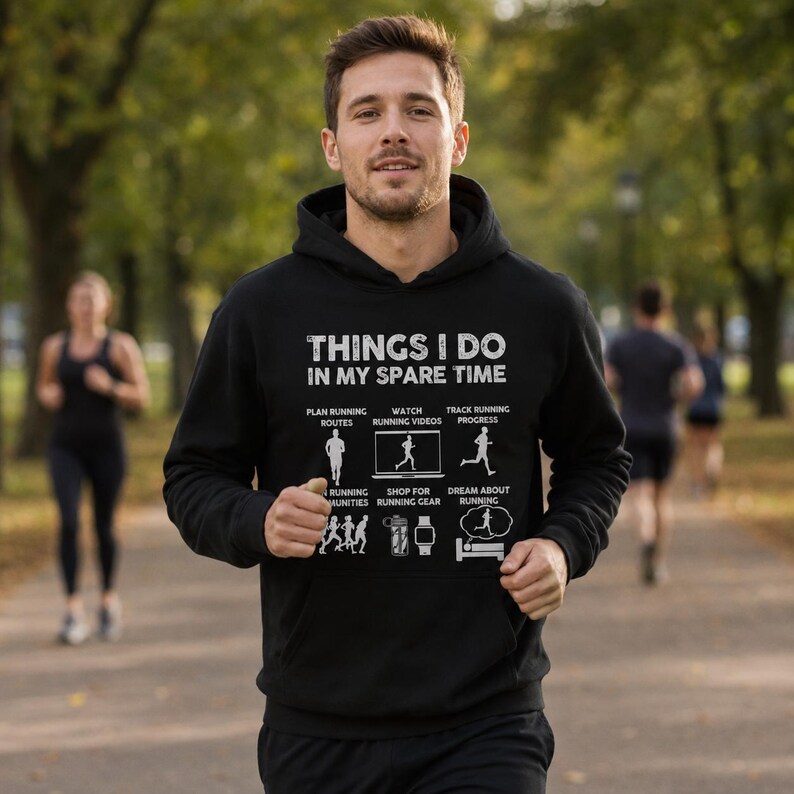 May include: A black hooded sweatshirt featuring white text that reads THINGS I DO IN MY SPARE TIME, accompanied by six graphic icons depicting running-related activities including planning routes, watching videos, and tracking progress.