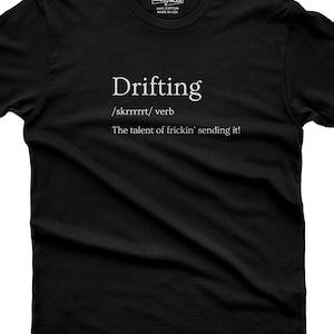 May include: A black short-sleeved t-shirt featuring white text that reads Drifting /skrrrrrt/ verb The talent of frickin' sending it! The inner neck label displays 365CAR MODS, 100% COTTON, and MADE IN USA. The shirt has a crew neckline and a standard fit.