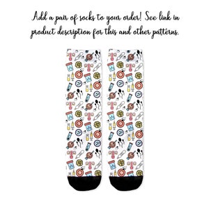 May include: A pair of white socks with a colorful pattern of various medical and reproductive symbols, including sperm, eggs, uteruses, and test tubes. The socks have black toes and heels.
