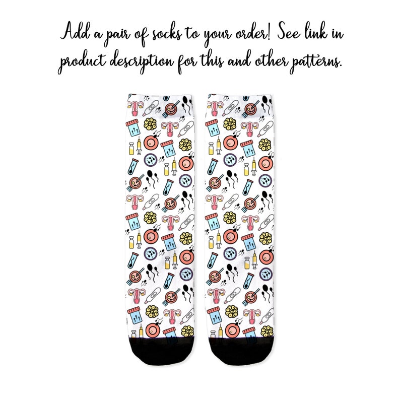 May include: A pair of white socks with a colorful pattern of various medical and reproductive symbols, including sperm, eggs, uteruses, and test tubes. The socks have black toes and heels.