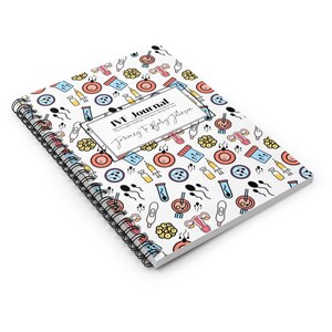 May include: A white spiral bound journal with a colorful pattern of IVF related icons. The cover has a black rectangle with the text "IVF Journal" and "Journey to Baby Johnson".
