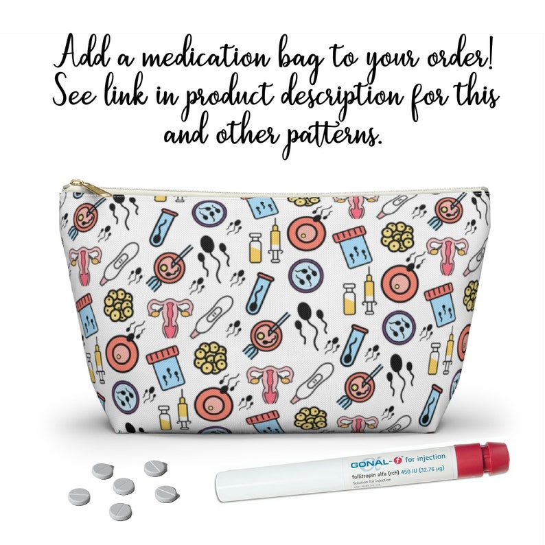 May include: White zippered pouch with a colorful pattern of fertility symbols, including sperm, eggs, a uterus, and a pregnancy test. The pouch is sitting on a white surface next to a white pen and several white pills.