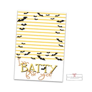 May include: A printable Halloween cookie wrapper with a yellow and white striped background. Black bats are scattered across the background. The text "I'm Batty for ya!" is printed in orange and black at the bottom of the wrapper.