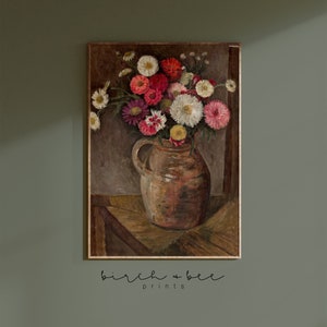 May include: A vintage painting of a bouquet of pink, red, and white flowers in a brown ceramic vase. The flowers are arranged in a loose, natural style, and the vase is sitting on a wooden table. The background is a muted brown color.