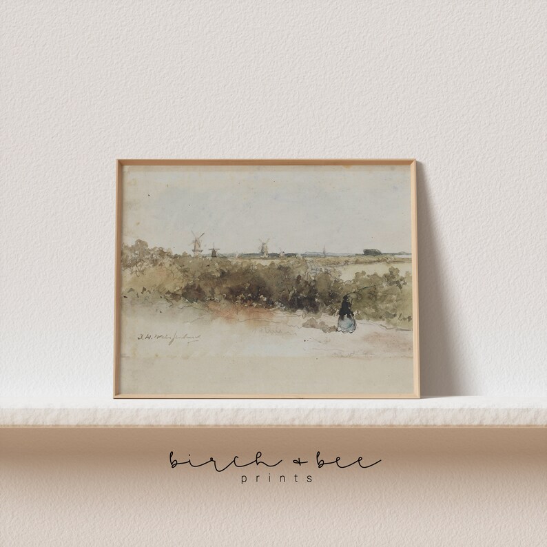May include: A watercolor painting of a rural landscape with windmills in the distance. A lone figure walks along a path in the foreground. The painting is framed in a light wood frame.